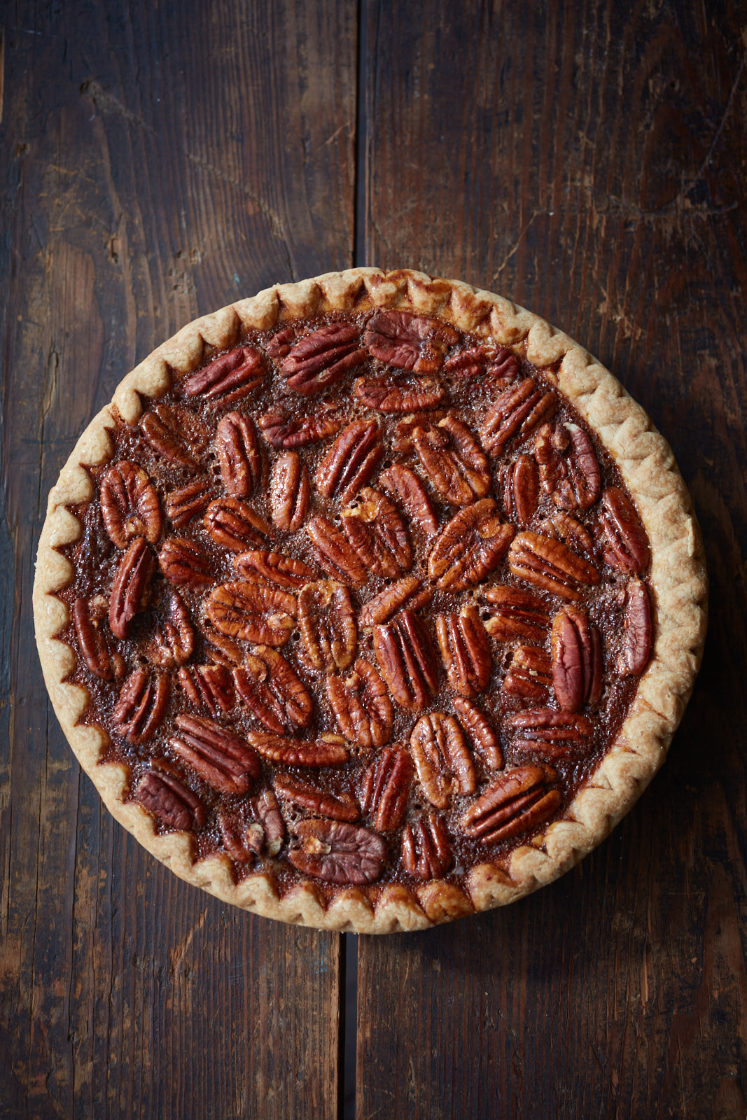 Pecan pie on a wooden surface